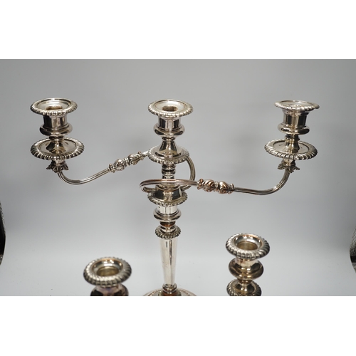 1354 - A Sheffield plate two branch, three light candelabra and a pair of  candlesticks, candelabra 36cm hi... 