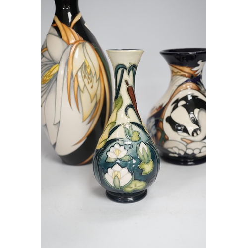 1355 - Three Moorcroft vases - a trial vase by Philip Gibson, another trial vase and a Harebell Wood limi... 