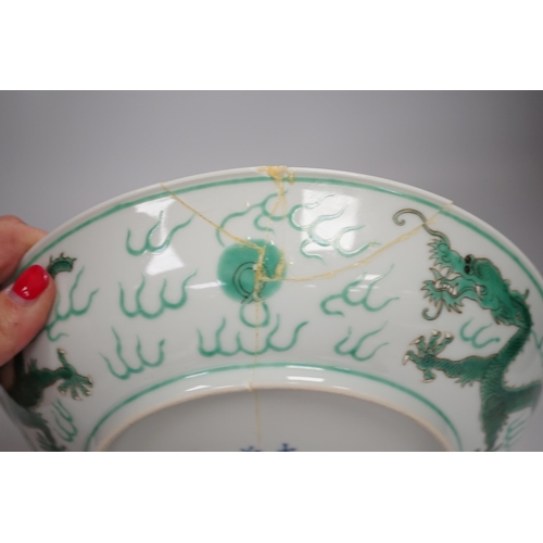 1356 - A Chinese green enamelled porcelain dragon dish, 24cm in diameter (a.f.)