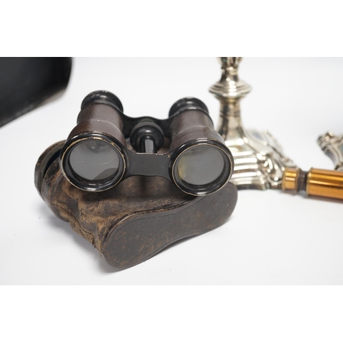 1357 - A brass single draw telescope, cased opera glasses, a pair of plated candlesticks, etc.