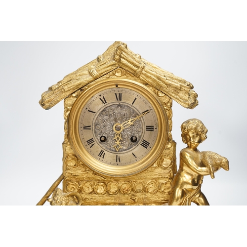 1360 - A 19th century ormolu clock, Richard & Cie stamped movement, case formed as a log cabin with child a... 