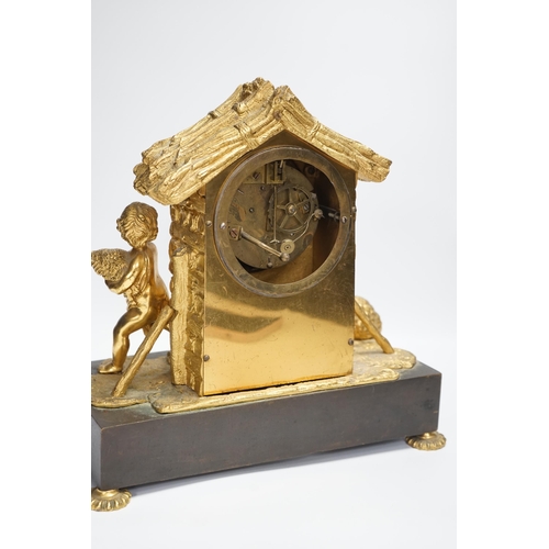 1360 - A 19th century ormolu clock, Richard & Cie stamped movement, case formed as a log cabin with child a... 