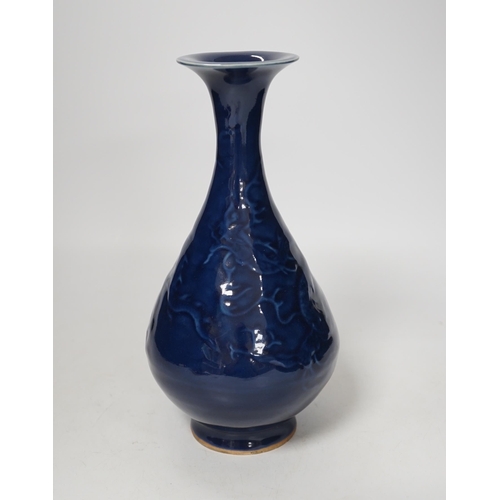 1384 - A Chinese blue monochrome vase, 24cm high