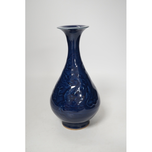 1384 - A Chinese blue monochrome vase, 24cm high