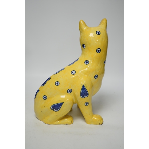 1393 - A Mosanic Galle style faience seated cat with glass eyes, c.1900-10, 31cm