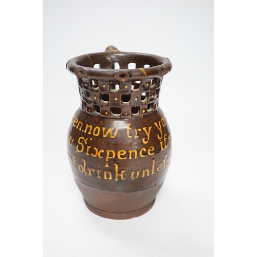 1399 - A 19th century slipware puzzle jug, 19cm