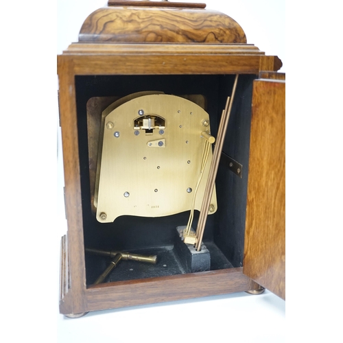 1403 - An Elliott mantel clock, the dial inscribed Arthur Saunders, London, 31cm high