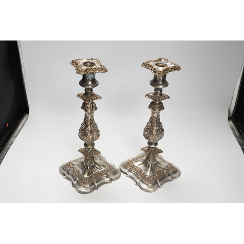 1407 - A pair of silver plate Sheffield candlesticks, 31cm high