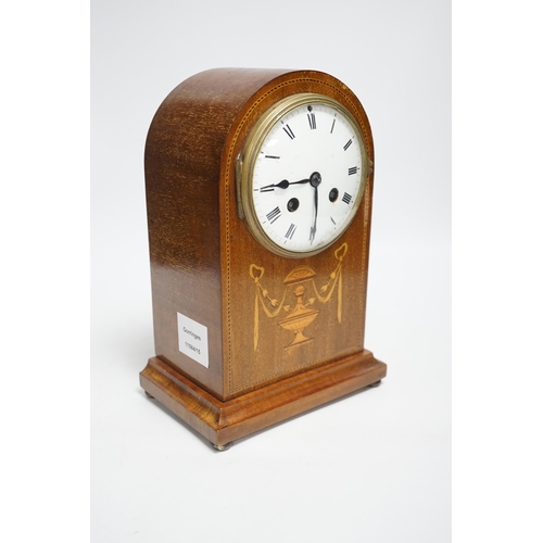 1409 - An Edwardian marquetry mantel clock with enamel dial, the case inlaid with swags, 26cm high