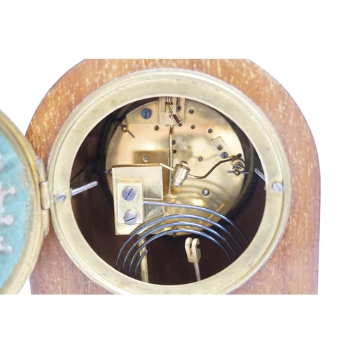 1409 - An Edwardian marquetry mantel clock with enamel dial, the case inlaid with swags, 26cm high