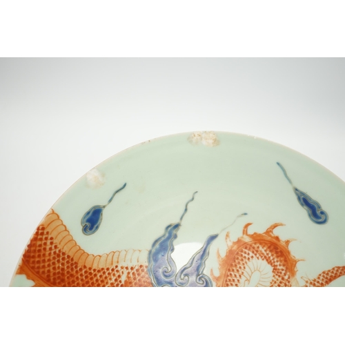 1423 - A Chinese enamelled porcelain 'dragon' dish, 27cm high