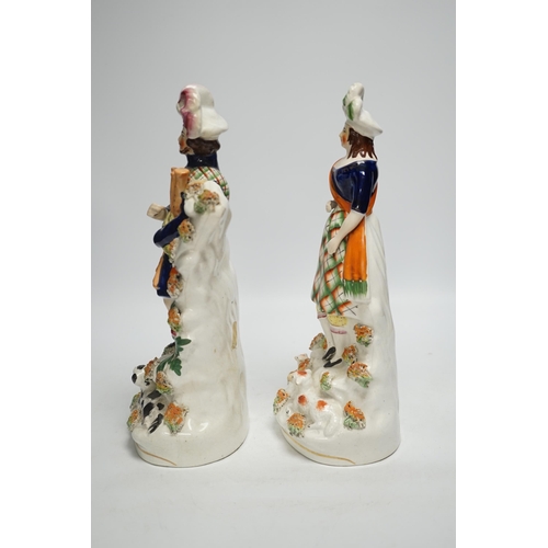 1440 - A pair of Victorian Staffordshire figures of Scots musicians