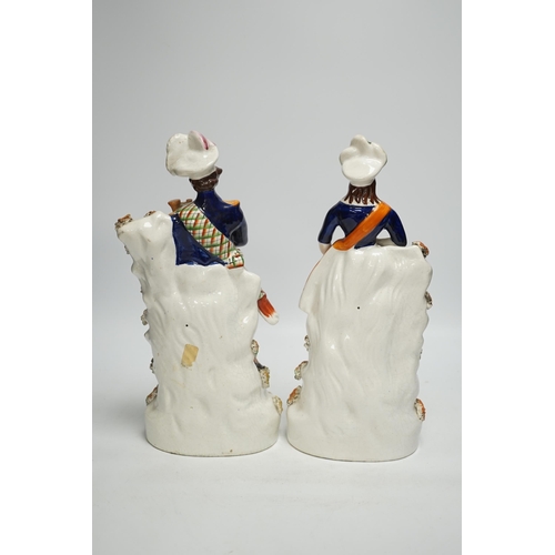 1440 - A pair of Victorian Staffordshire figures of Scots musicians