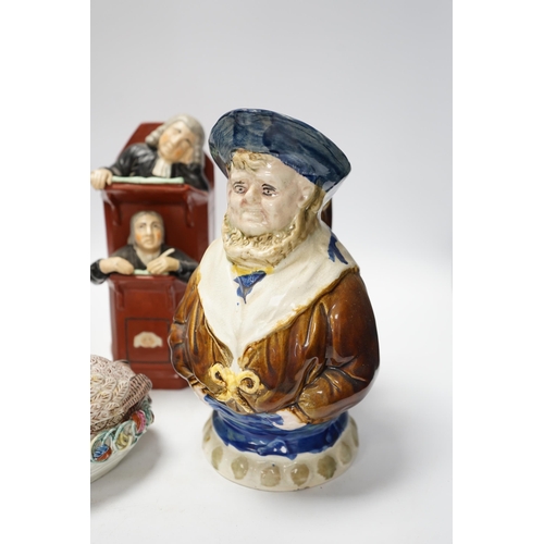 1451 - A Staffordshire figure of Wellington, a majolica sailor jug and a Vicar and Moses group, largest 32c... 