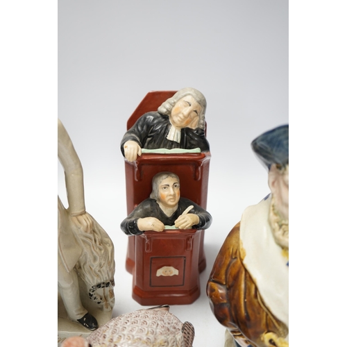 1451 - A Staffordshire figure of Wellington, a majolica sailor jug and a Vicar and Moses group, largest 32c... 