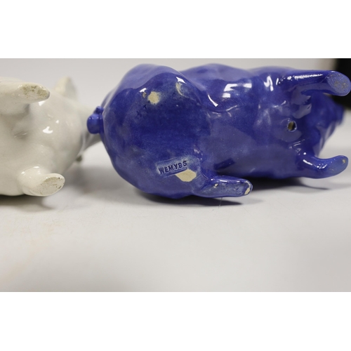 1476 - Three Wemyss ware pigs in cream, blue and pink glazes, 15cm