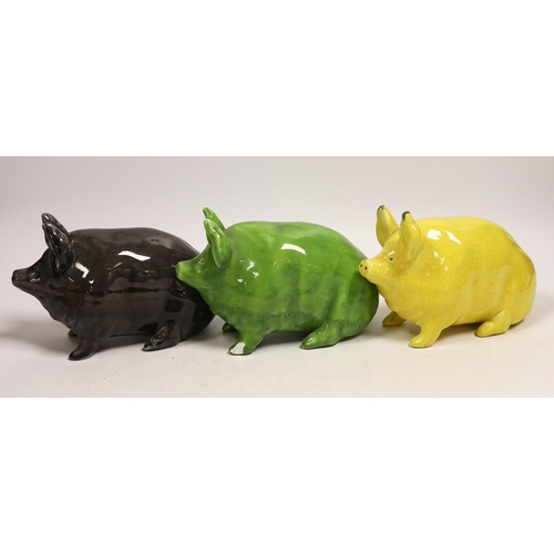 1478 - Three Wemyss ware  pigs in green, yellow and black glazes, 15cm