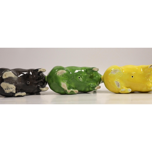 1478 - Three Wemyss ware  pigs in green, yellow and black glazes, 15cm