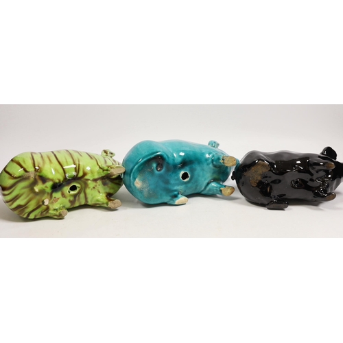 1485 - Three Wemyss style pigs in turquoise, pale green / brown and black glazes, one indistinctly marked W... 