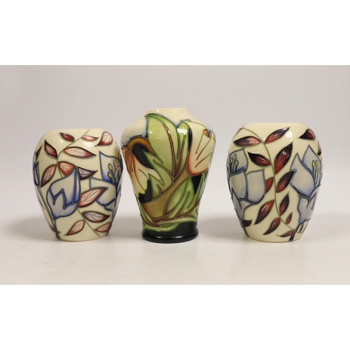 1493 - Seven small Moorcroft vases, various patterns. Tallest 10cm