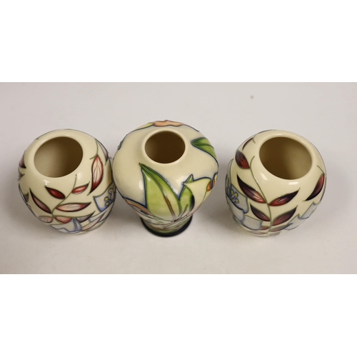 1493 - Seven small Moorcroft vases, various patterns. Tallest 10cm