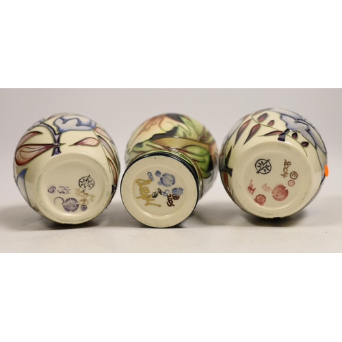 1493 - Seven small Moorcroft vases, various patterns. Tallest 10cm