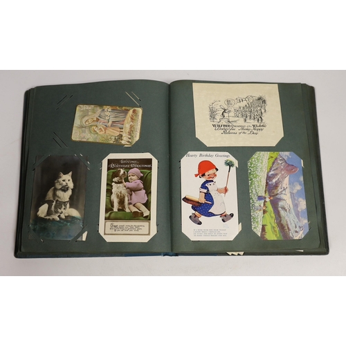 1502 - A postcard album containing Edwardian and later postcards relating to Bonzo, Attwell etc