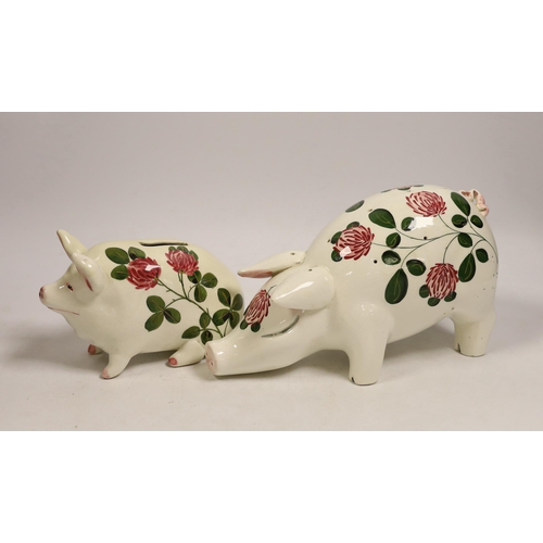 1513 - A Plichta rose decorated pig money box, 16cm, and a Plichta rose decorated hatpin holder pig, 23cm a... 