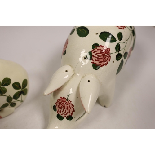 1513 - A Plichta rose decorated pig money box, 16cm, and a Plichta rose decorated hatpin holder pig, 23cm a... 