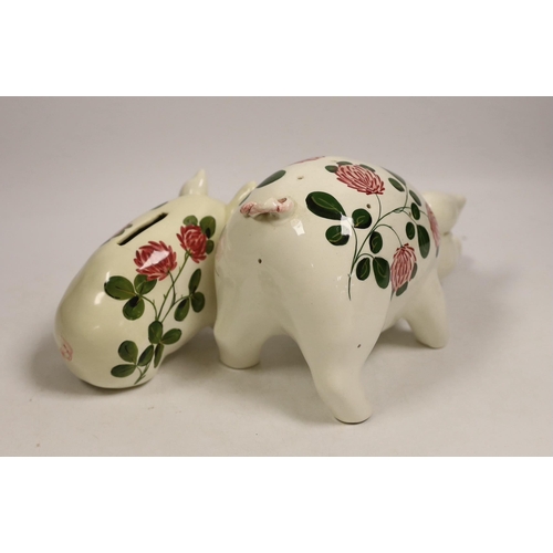 1513 - A Plichta rose decorated pig money box, 16cm, and a Plichta rose decorated hatpin holder pig, 23cm a... 