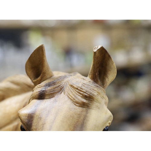 1557 - A large wooden carving of a horse and foal, 70cm wide