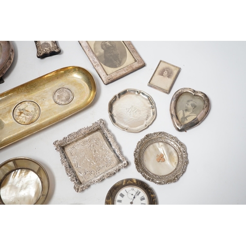 1856 - Sundry small silver and white metal items including seven photograph frames, largest 12.5cm, an 800 ... 