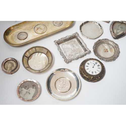 1856 - Sundry small silver and white metal items including seven photograph frames, largest 12.5cm, an 800 ... 