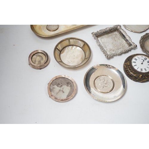 1856 - Sundry small silver and white metal items including seven photograph frames, largest 12.5cm, an 800 ... 