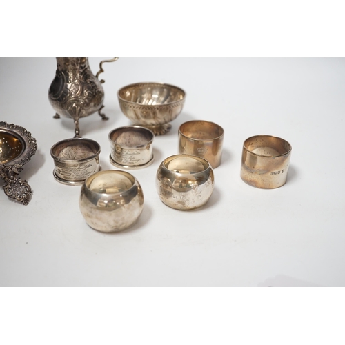 1857 - Sundry silver including six silver napkin rings, an 800 standard tea strainer and a white metal bowl... 