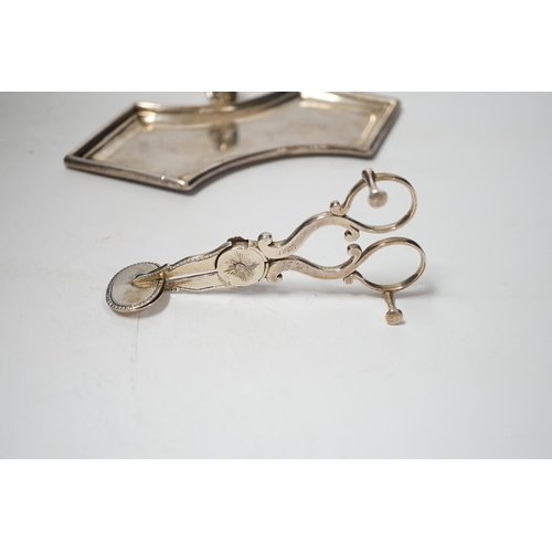 1859 - A George II silver snuffers stand, London, 1743, 19.4cm, together with a later pair of silver candle... 