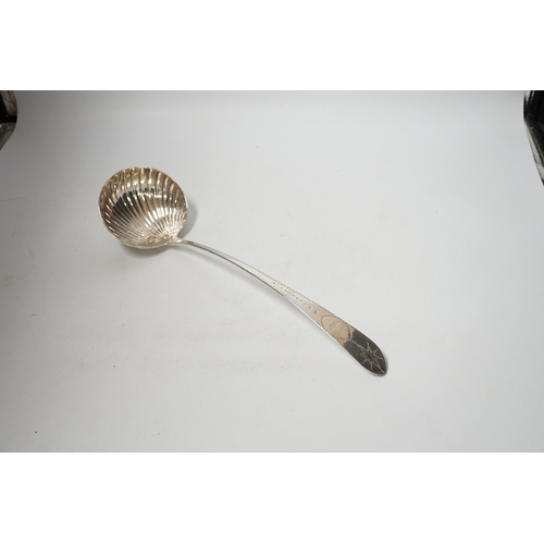 1861 - A George III Irish engraved silver soup ladle, John Shiels?, Dublin, 1793, 36cm, with fluted bowl,... 