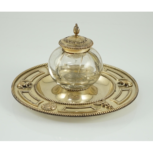 1868 - A Victorian silver gilt circular inkstand, by Robert Hennell III, with single mounted glass well and... 