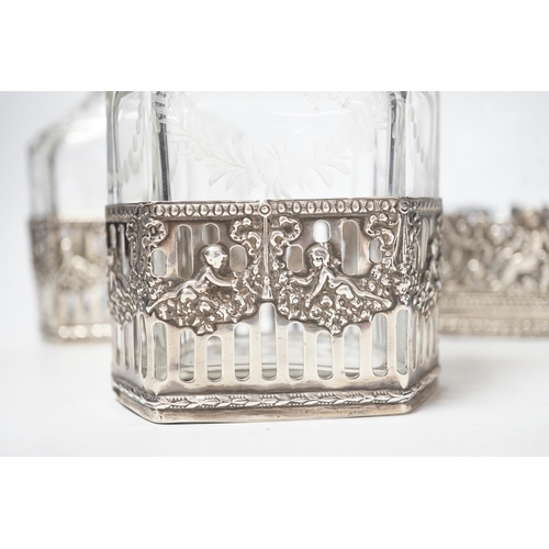 1871 - A George V Hanau silver mounted etched glass three piece decanter suite, import marks for Berthold H... 