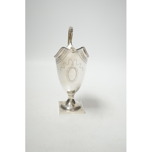 1873 - A modern George III style helmet shaped cream jug, on square base, C.J. Vander Ltd, London, 1972, 16... 