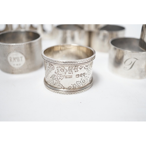 1875 - A set of six silver napkin rings, Robert Pringle & Sons, London, 1953, two other silver napkin rings... 