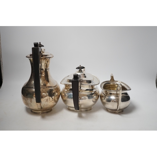 1884 - A George V silver coffee pot, teapot and sugar bowl, Fordham & Fordham, Sheffield, 1923. gross weigh... 