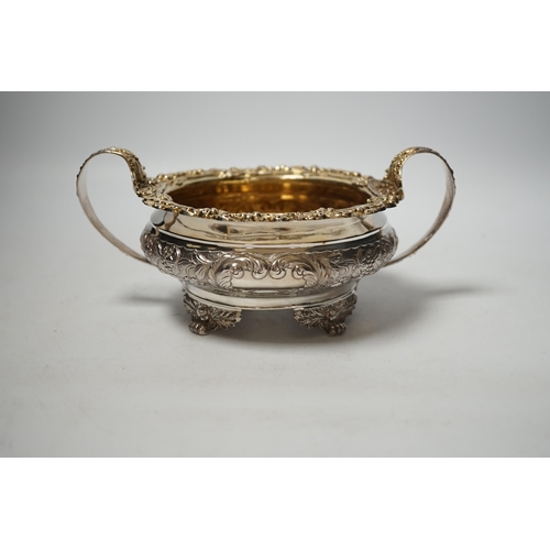 1886 - A George IV embossed silver two handled sugar bowl, Thomas James, London, 1822, diameter 14.7cm, 12.... 