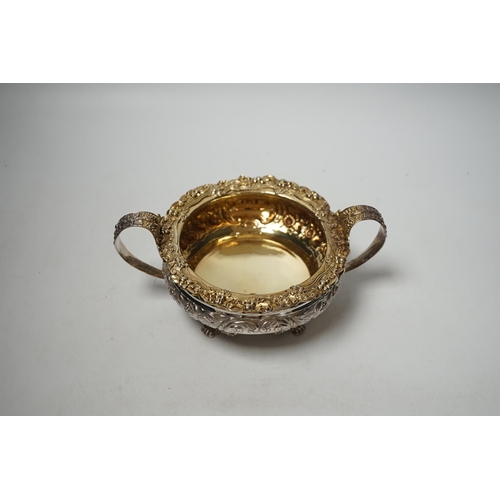 1886 - A George IV embossed silver two handled sugar bowl, Thomas James, London, 1822, diameter 14.7cm, 12.... 