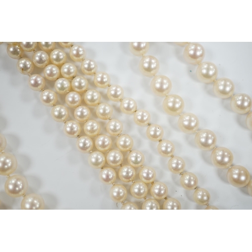 1934 - A single strand cultured pearl necklace, with diamond chip set 18ct gold clasp, 74cm and similar bra... 