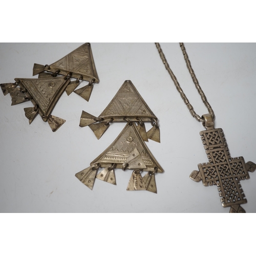 1940 - An Ethiopian white metal cross pendant necklace, overall 90cm, together with a pair of Tuareg silver... 