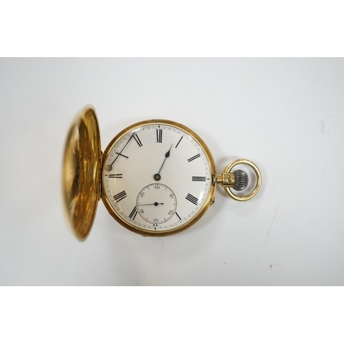 1941 - An 18ct gold keyless hunter pocket watch, with Roman dial and subsidiary seconds, the case with engr... 