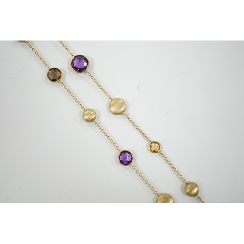 1946 - A modern Italian 9ct gold pebble and graduated multi gem set necklace, 68cm, gross weight 16 grams.... 