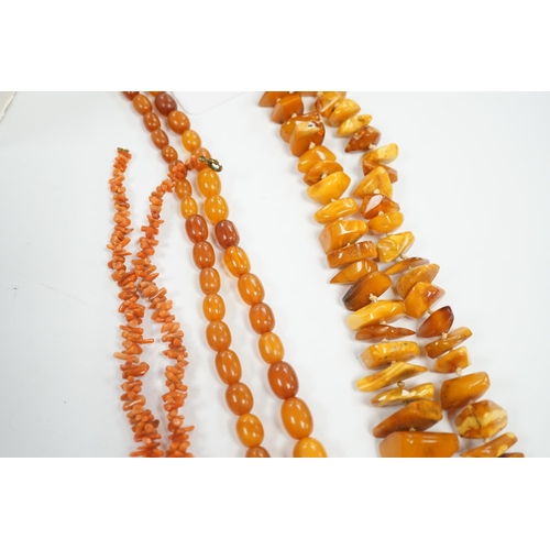 1953 - A single strand graduated amber bead necklace, 56cm, gross weight 34 grams, one other amber necklace... 