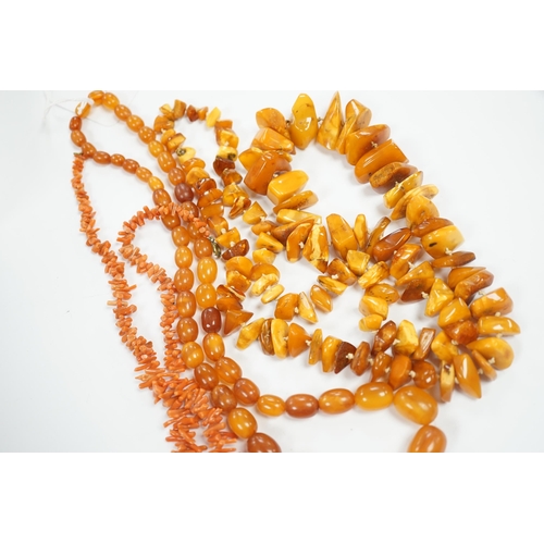 1953 - A single strand graduated amber bead necklace, 56cm, gross weight 34 grams, one other amber necklace... 